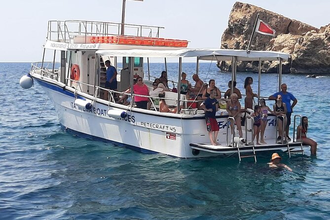 Comino Blue Lagoon and Gozo-Sea Star Boat Private Tour - Crystal Lagoon and its cave-framed water