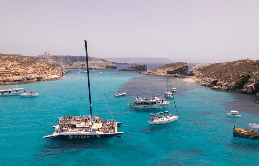 Comino: Blue Lagoon Catamaran Cruise with Lunch and Open Bar - Swimming and snorkeling at the bays