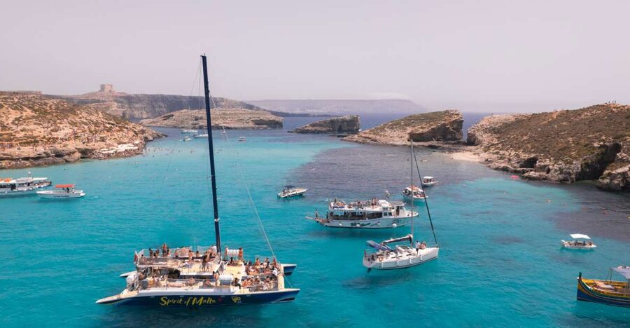 Comino: Blue Lagoon Catamaran Cruise with Lunch and Open Bar - Sailing toward Comino