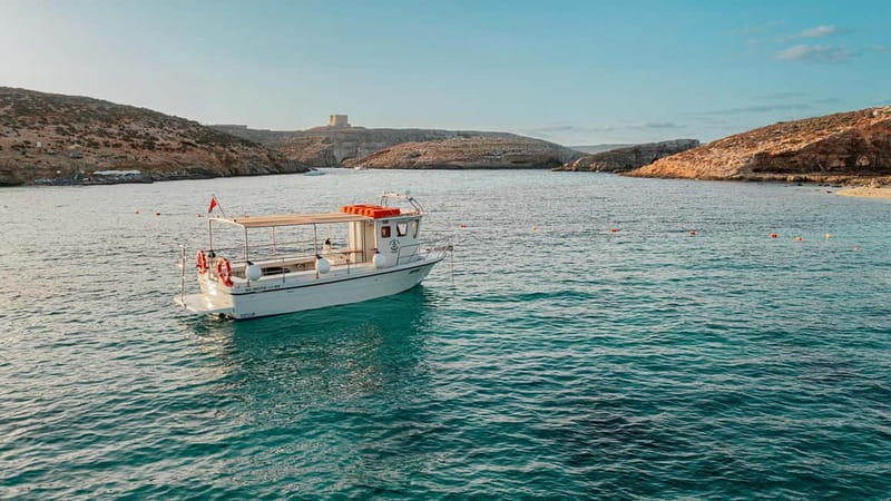 Comino: Blue Lagoon, Crystal Lagoon and Sea Caves Boat Tour - Crystal Lagoon: the best water stop for color