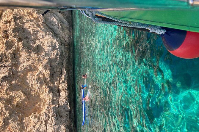 Comino Private Boat with Snorkeling and Cave Sightseeing - Crystal Lagoon, two caves, and Saint Mary’s Tower