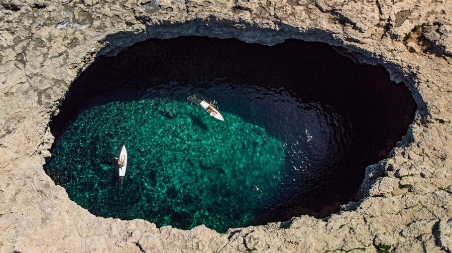 From Mellieħa: Coral Lagoon Kayak Rental - Entering the Coral Lagoon Cave by Kayak