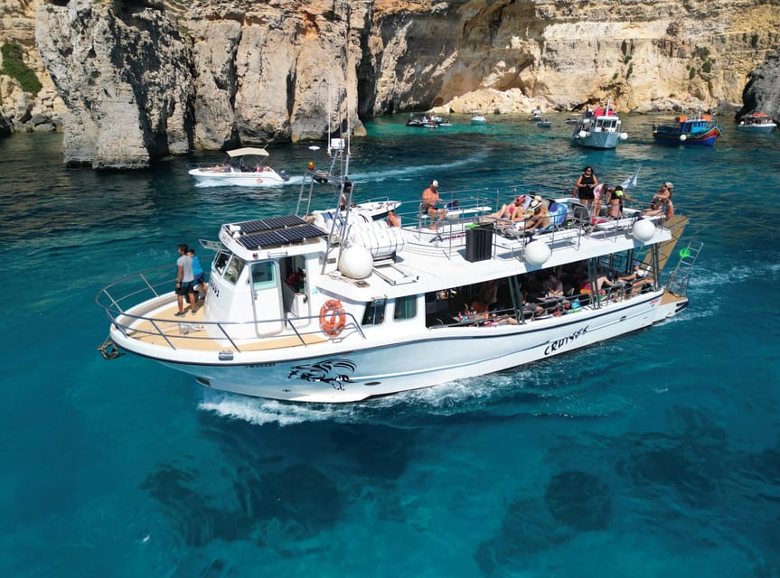 From Mellieha: Three Bay Cruise including the Blue Lagoon - The return past Santa Maria Caves and Elephant Rock