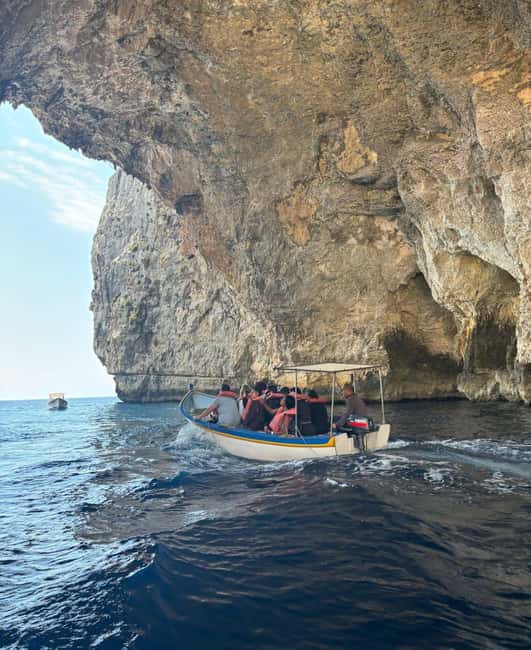 From Sliema: Blue Grotto Trip - Including Boat Cave Tour - The short walk toward Xutu Tower