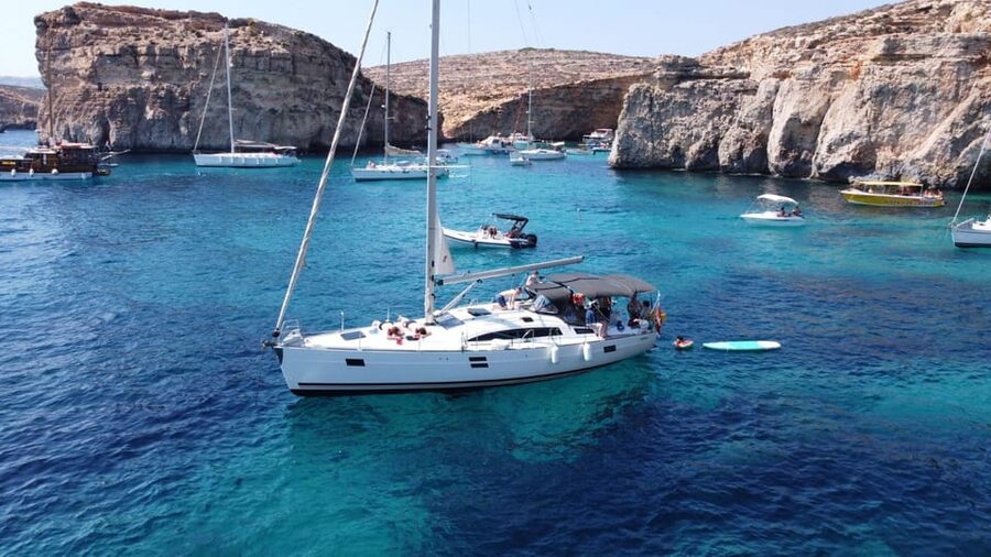 From Valletta: Romantic Sunset Cruise on a Sailing Yacht - Swimming in a quiet bay