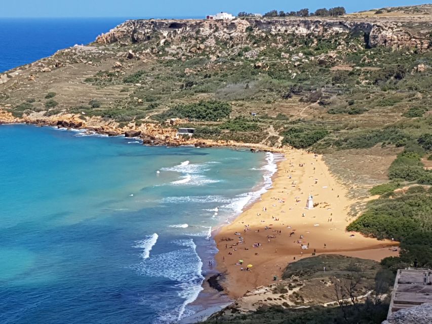 Gozo - Funtastic Daytrips - - Tal Mixta Cave and the view over Ramla Bay