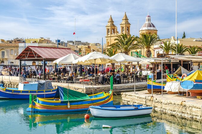 Half Day Tour in Marsaxlokk Village, Market, Blue Grotto & Qrendi - The Sunday market: Food, lace, clothes, and local browsing