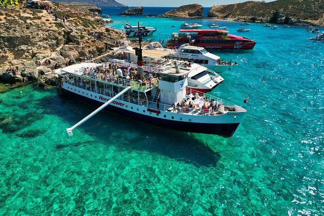Malta: Comino, Blue Lagoon & Caves - swim, snorkel & slide - Ahrax Cave, Mellieha Bay, and Coral Cove