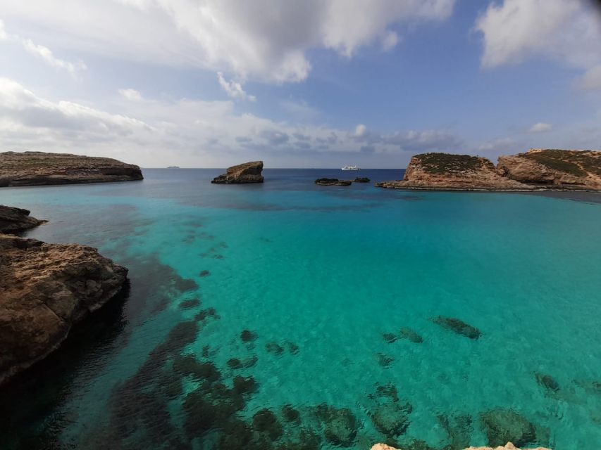 Malta: Comino, Blue lagoon, Crystal Lagoon Private Boat Tour - Blue Lagoon: beautiful water, busy shore