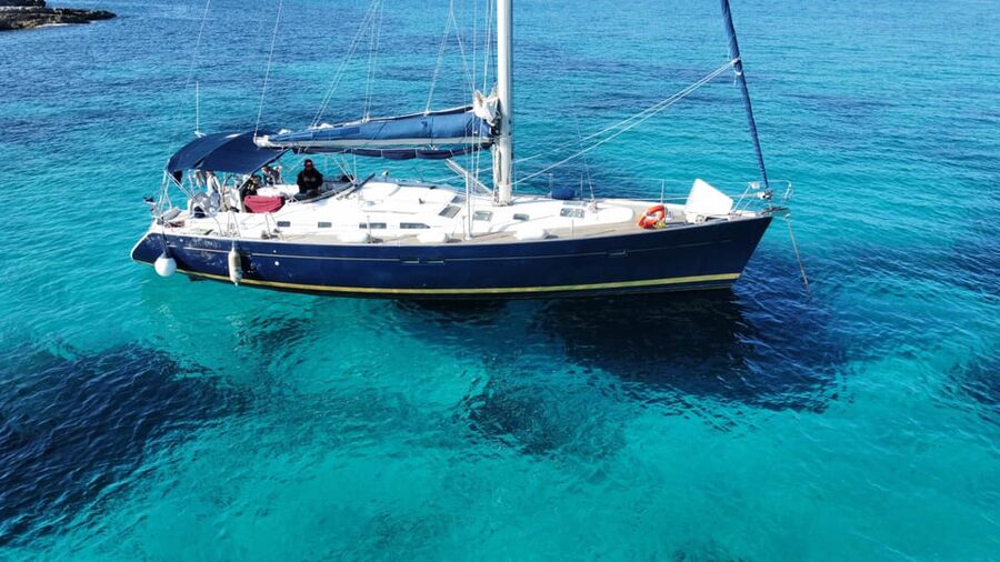 Malta Gozo Comino: Full Day Sailing Charter - Cruising past cliffs and rocky coves