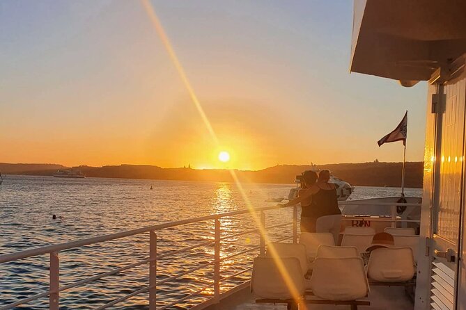 Malta Sunset Boat Tour: Bugibba to Comino Blue Lagoon Cruise - Swimming, snorkeling, and the water slide