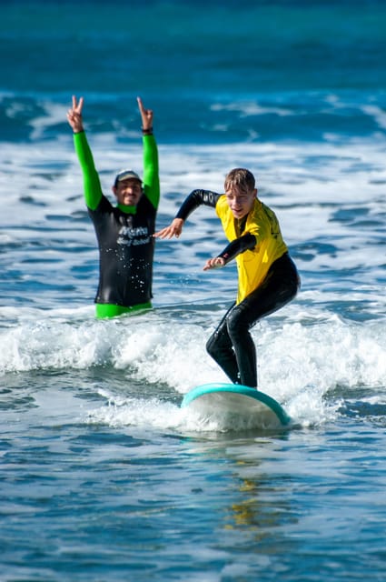 Malta Surf School, Beginner Surf Lessons - Moving into chest-high water