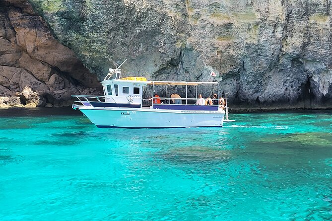 Mellieha: Gozo, Comino, Sea Caves, and Blue Lagoon Cruise - Blue Lagoon: beautiful, busy, and worth planning for