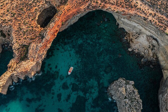 Mellieha: Gozo, Comino, Sea Caves, and Blue Lagoon Cruise - Comino’s quieter bays and coastal views