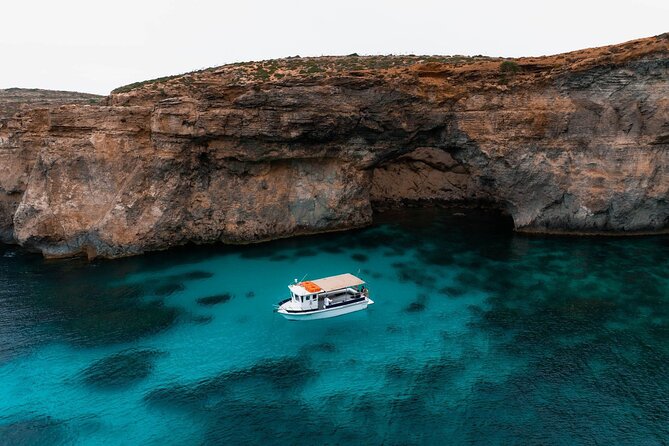 Mellieha: Gozo, Comino, Sea Caves, and Blue Lagoon Cruise - Leaving Mellieħa for Comino