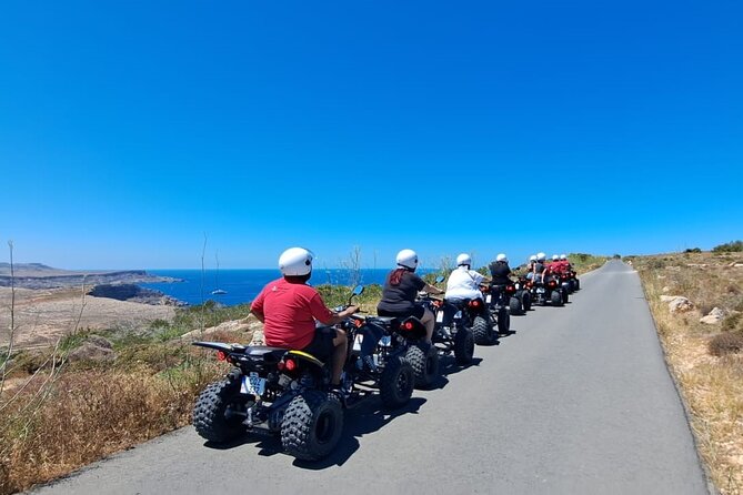 North Malta Quad Bike Tour with Land or Sea Views and Swimming - Mellieha Church Square and village life