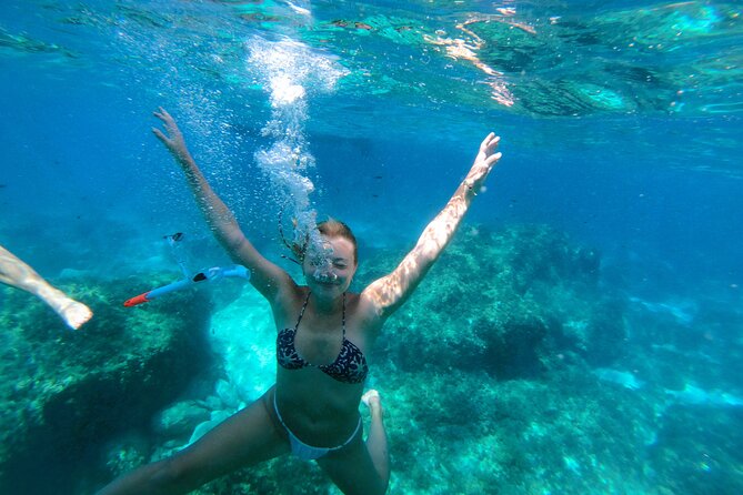 Private Boat Tour to Blue Lagoon Comino Caves and Gozo - Blue Lagoon: famous, beautiful, and busy