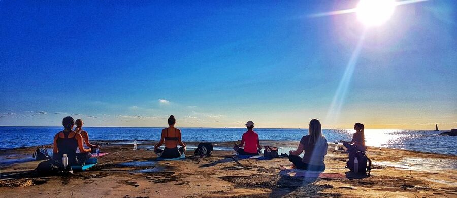 Sliema: Beach Yoga Class with Swimming - Sunrise or sunset: choosing your session