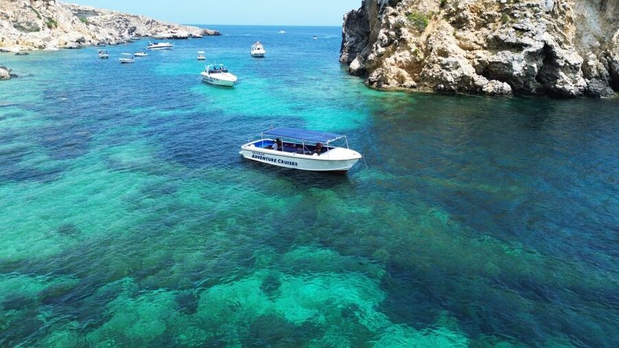 Sliema: Boat Trip to Comino Blue Lagoon, Gozo, and Caves - Comino’s caves are best seen from the boat