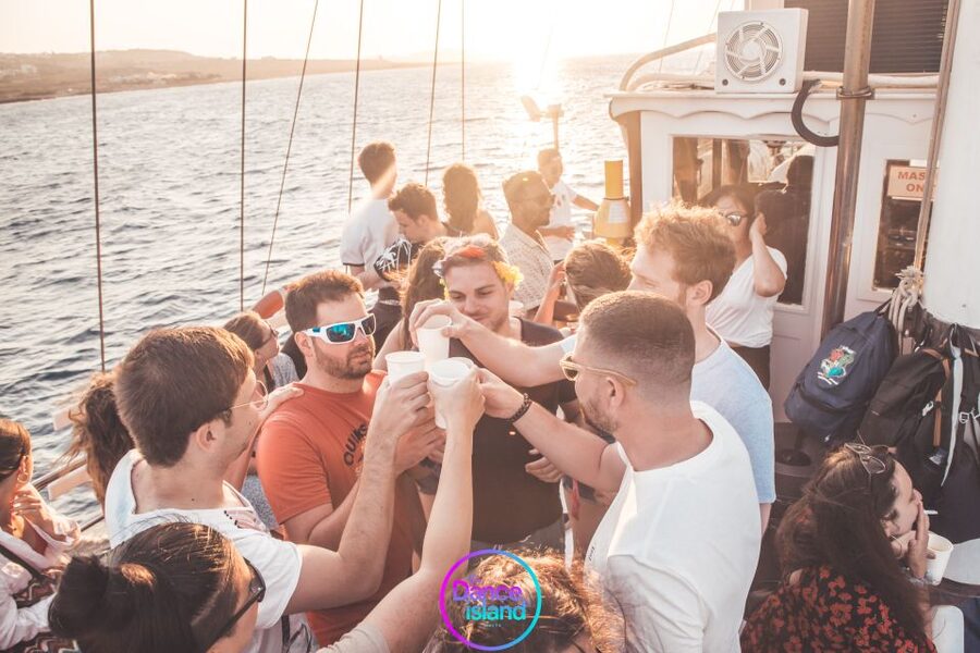 Sliema: Sailboat Party with an Open Bar, Food, and Swimming - The swim stop in clear Mediterranean water