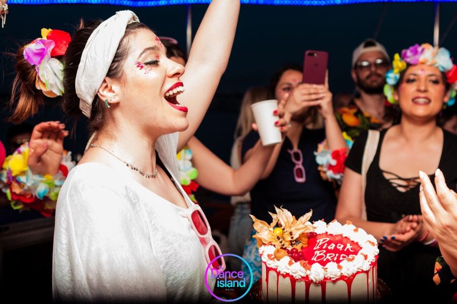 Sliema: Sailboat Party with an Open Bar, Food, and Swimming - The onboard photographer
