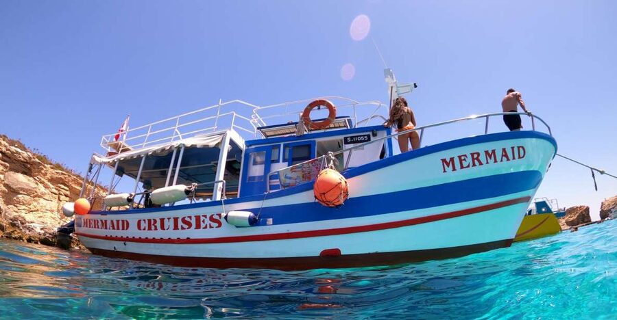 St Paul's Bay: Comino, Blue Lagoon, Gozo, & Caves Boat Tour - Blue Lagoon: beautiful, crowded, and worth seeing