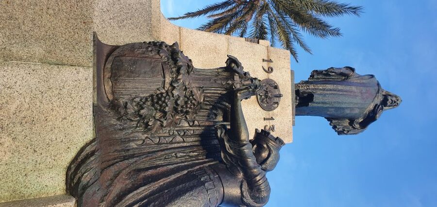 Valletta: Food Walking Tour with Tastings - Walking Republic Street with food in hand